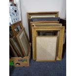 A large quantity of antique and later gilt framed picture frames