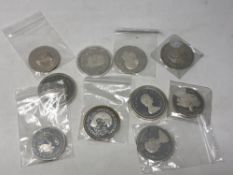 Silver proof coins; Mauritius 50 rupees 1975, Mauritius 25 rupees 1975, Tanzania 50 shilingi 1974,