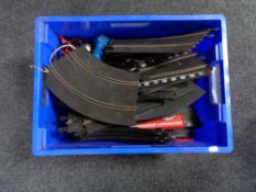 A plastic crate of Scalextric items