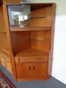 A mid century teak G-plan corner cabinet