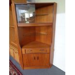 A mid century teak G-plan corner cabinet