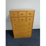 A twentieth century pine ten drawer chest