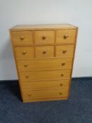 A twentieth century pine ten drawer chest