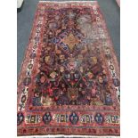 A Hamadan rug, 316cm by 163cm, a/f CONDITION REPORT: Numerous patches moth-damaged.