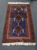 An Afghan prayer rug, 158cm by 93cm,