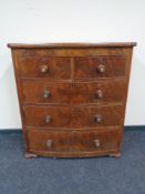 A Victorian mahogany bow fronted five drawer chest