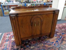 A 1930's walnut cocktail sideboard