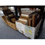 Four boxes of antique and later picture frames, framed prints,