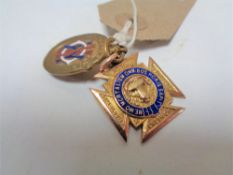 A 9ct gold ROAB medal together with one other.