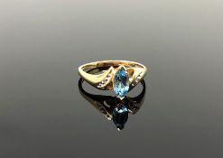 A 10ct gold topaz and diamond ring,