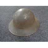 A twentieth century tin helmet