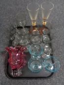 A tray of glass, wine glasses,