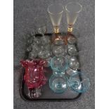 A tray of glass, wine glasses,