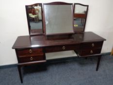 A Stag Minstrel dressing table with triple mirror