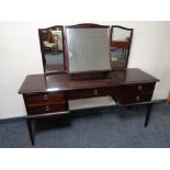 A Stag Minstrel dressing table with triple mirror