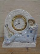 A Lladro figural mantel clock