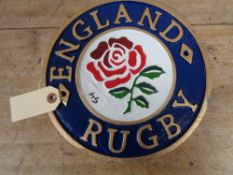 A metal England rugby plaque