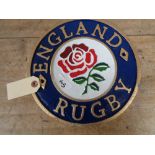 A metal England rugby plaque