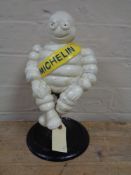 A metal figure - Seated Michelin man