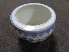 A Chinese blue and white glazed fish bowl planter