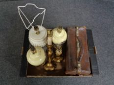 A box of gilt wood table lamps, vintage leather Gladstone bag,