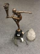 An Art Deco figural table lamp on marble base in the form of a dancer with torch (a/f)