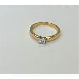 An 18ct gold princess cut diamond solitaire ring, size N.