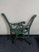 A set of cast iron bench ends