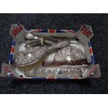 A box of four piece silver backed dressing table set together with a bundle of silver handled