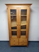 A pine double door bookcase