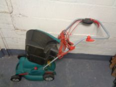 An electric lawn mower and box