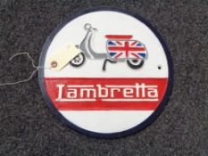 A metal Lambretta plaque