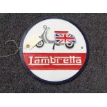 A metal Lambretta plaque