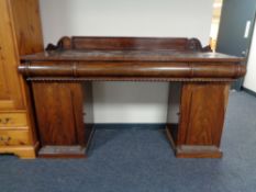 A nineteenth century mahogany pedestal sideboard