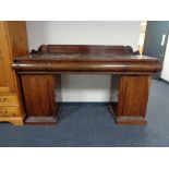 A nineteenth century mahogany pedestal sideboard