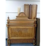 An antique continental oak 4' bed frame