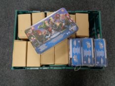 A crate of Smart Genes puzzles and Marvel super heroes puzzles