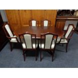 A mahogany Morris of Glasgow extending table and six chairs
