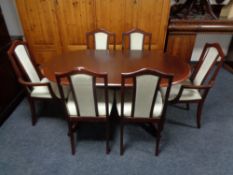 A mahogany Morris of Glasgow extending table and six chairs