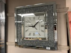 A contemporary square wall clock