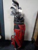 A Dunlop golf bag containing clubs