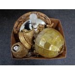 A box of gilt wood cornice, circular gilt convex mirror, cherub lamp,