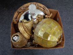 A box of gilt wood cornice, circular gilt convex mirror, cherub lamp,