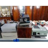 Four vintage projectors to include a Rank Albus in fitted wooden box, Prinz Auto,