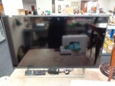 A Sony Bravia KDL-40 WE663 tv with lead and remote