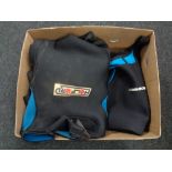 A box of three wet suits size medium