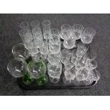 A tray of assorted drinking glasses,