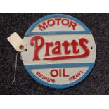 A metal Pratts Motor oil plaque