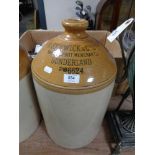 A large stoneware glazed flagon - R. Fenwick & Company, Sunderland.