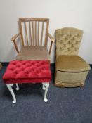 A 20th century teak armchair,